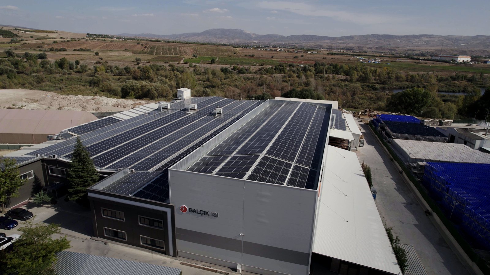 Drone view of the Balçık plant with the solar roof and the BALÇIK logo on the side wall