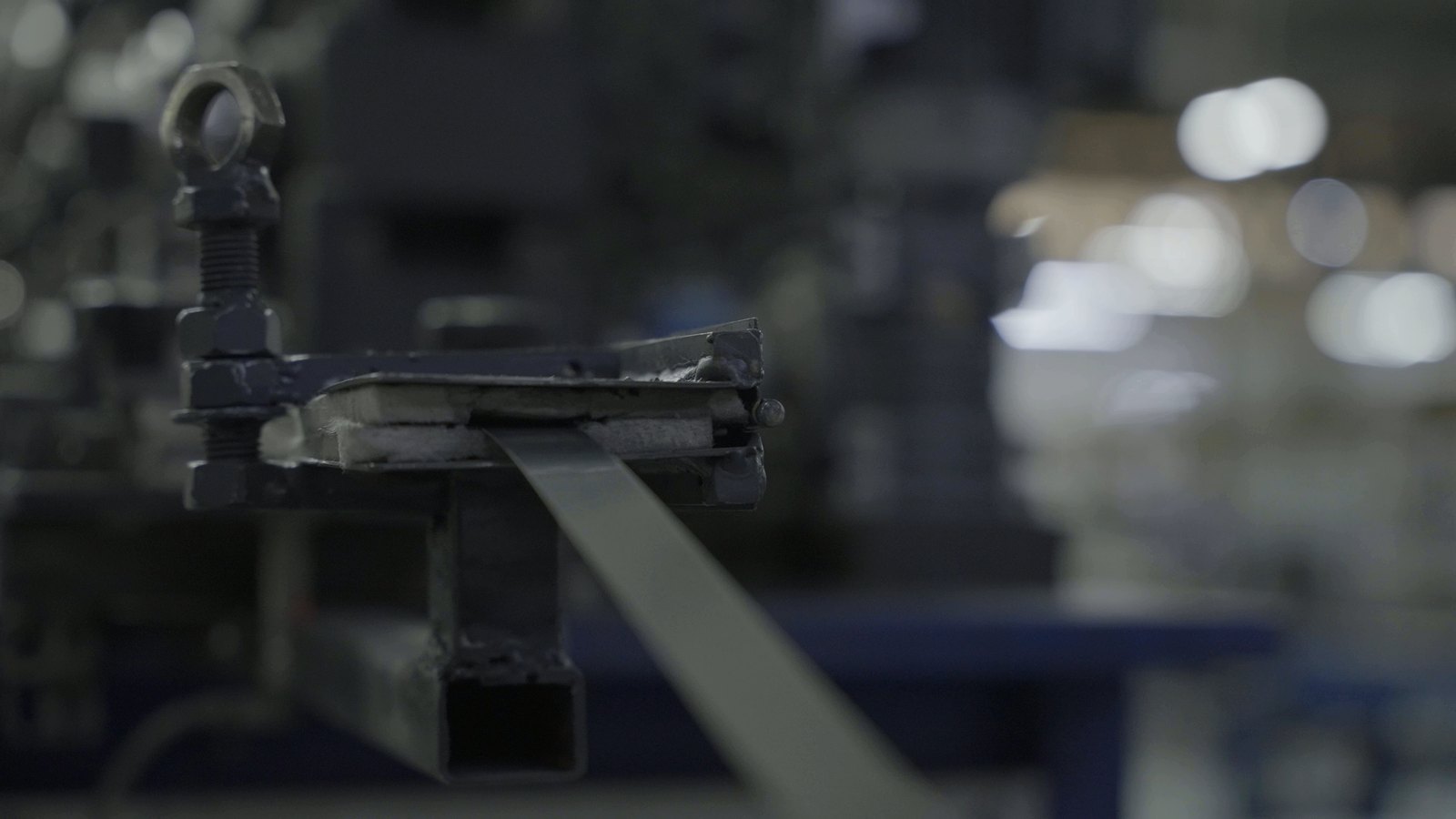 Stainless steel strip entering the Balçık tube mill