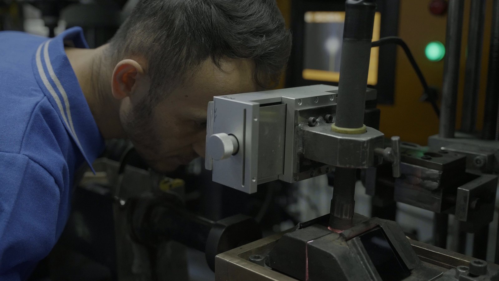 Operator adjusting the stainless steel tube mill